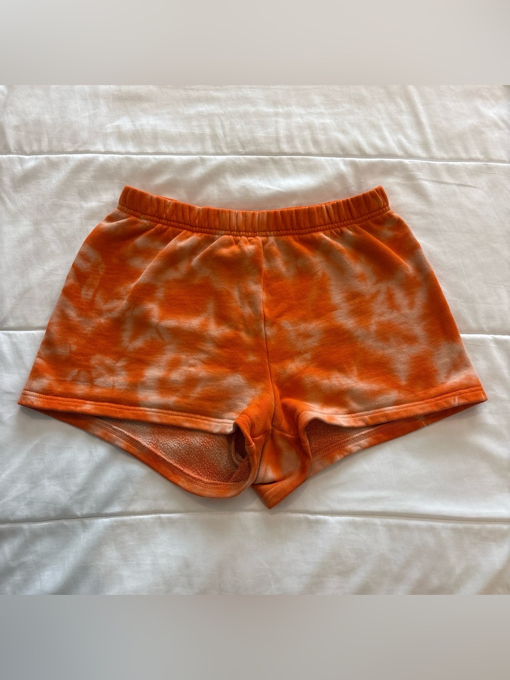 Aritzia TNA Tie‑Dye Orange Lounge Sweat Shorts